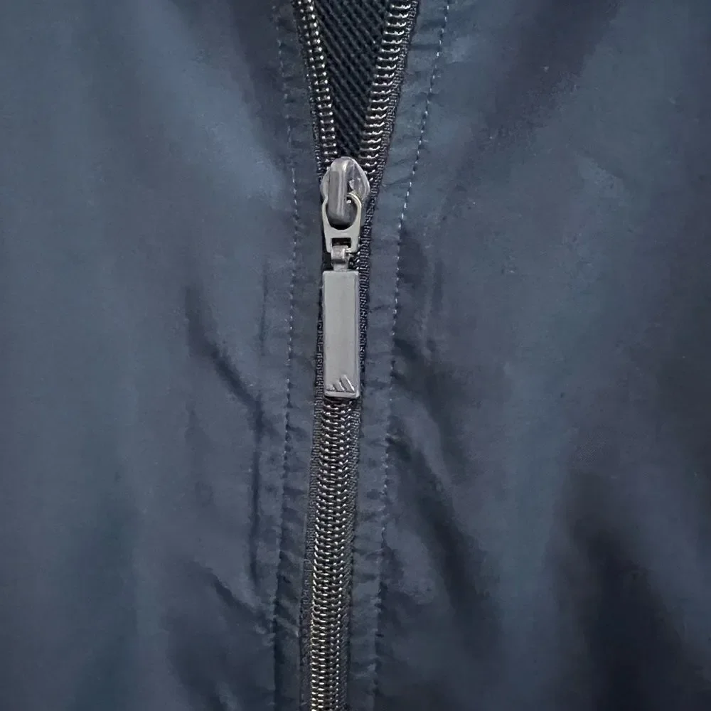Vintage Adidas youth large navy and light green zip up jacket